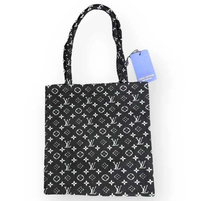 Louis Vuitton Black/White Soft Wool Mono Pattern U.L Tote: • Louis Vuitton • Tote • Soft/Wool • Black • White Accents • Monogram Pattern • Double Handles • Snap Closure • Uniform Line • 12.2" x 11.8" (in)