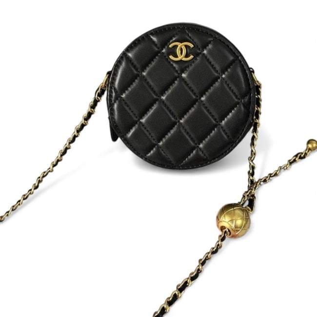 Chanel Black/Gold Pearl Crush Round Mini Beaute Clutch W/ Chain & Original Box: • CHANEL • Pearl Crush • Mini Clutch • Black • Quilted Pattern • Gold Tone Hardware • Gold Ball Detail • Intertwined Leather Chain Strap • Front Logo &bull