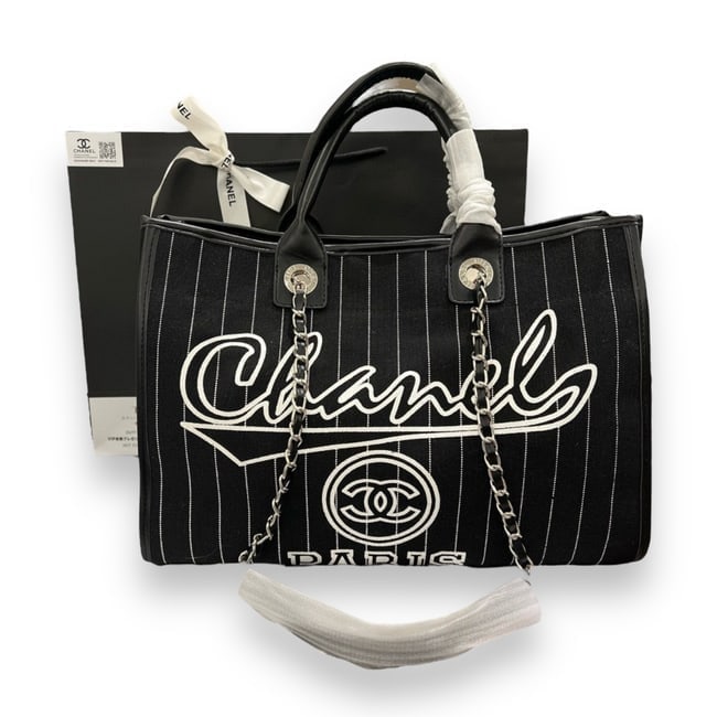 CHANEL XL Black & White Deauville Striped Beaute Bag & Original CHANEL Gift Bag: • CHANEL • Black • White Accents • Silver Tone Hardware • Deauville • Tote • Striped Pattern • Red Interior • Front Logo • Snap Closure &bul