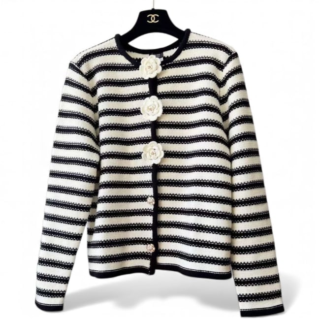 CHANEL White/Black Striped Button Up U.L Cardigan Sweater: • CHANEL • Women’s • Cardigan Sweater • Uniform Line • White • Black Accents • Striped Pattern • Button Up • Floral Detail On The Buttons • Long S