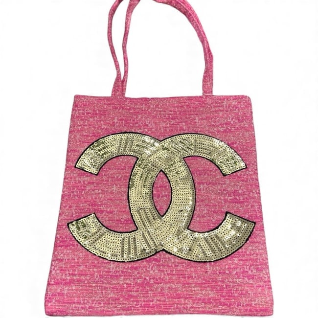 CHANEL Hot Pink & White/Gold Sequined Front CC Logo Tote: • CHANEL • Tote • Hot Pink • White Accents • Gold Sequined CC Logo • Double Handles • Comes In The Original Packaging • 12" x 11" (in) • Magnetic Snap Clos