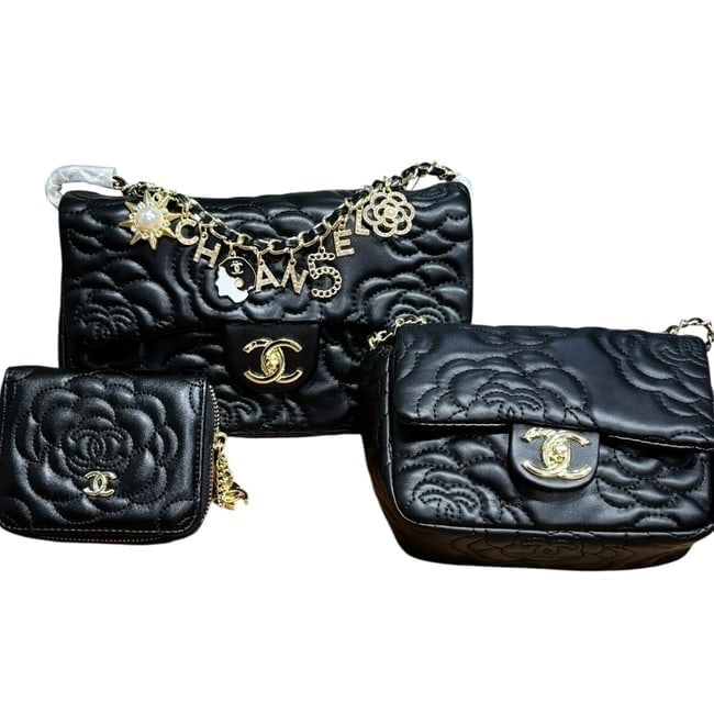 CHANEL 3 Pc Set Black/Gold Camelia Pattern CF & MF Beaute Bags, Matching Card Holder: • CHANEL • 3 PC Set: Includes 2 Bags & Card Holder • Card Holder • Black • Gold Tone Hardware • Camelia Pattern • Lg CF Bag Size: 10.5" x 6" x 3.8" (in) • MF Ba