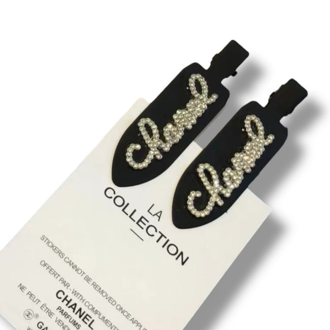 CHANEL 2Pc Black/White Rhinestone CC Logo Hair Clips & Gift Bag: • CHANEL • 2Pc Set • Hair Clips • L.A. Collection • Gabrielle • 2Pc Set • Black • White Rhinestone Covered Logo • Black Tone Hardware • U