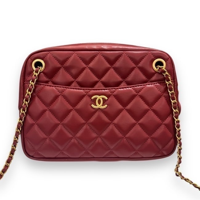 CHANEL Red Quilted Mini Beaute Bag & Original Box: • CHANEL • Red • Quilted Pattern • Gold Tone Hardware • Burgundy Interior • Exterior Slip Pocket • Front CC Logo • Zip Closure • Internal Zip Pocket