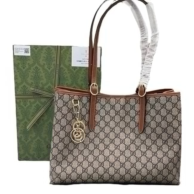 Gucci Ophidia GG Supreme Beaute Tote & Original Gift Bag: • Gucci • Ophidia • Tote • GG Supreme • Gold Tone Hardware • Double Handles • Hanging Charms • Snap Closure • Signature Red, Green, & White Interior &b
