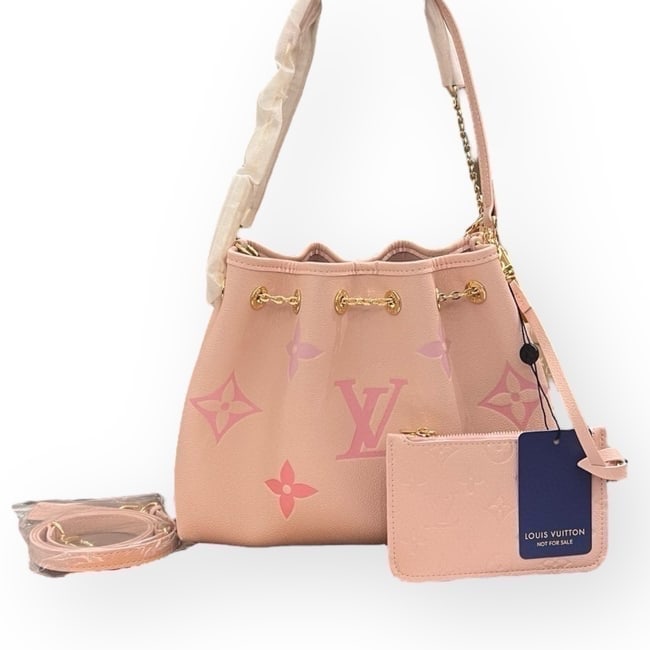 Louis Vuitton Pink Monogram Bucket Beaute Bag & Original Box: • Louis Vuitton • Pink • Monogram Print • Gold Tone Hardware • Bucket Bag • Shoulder Carry • Removable Pouch Included • Removable Strap Included • Hook Clo