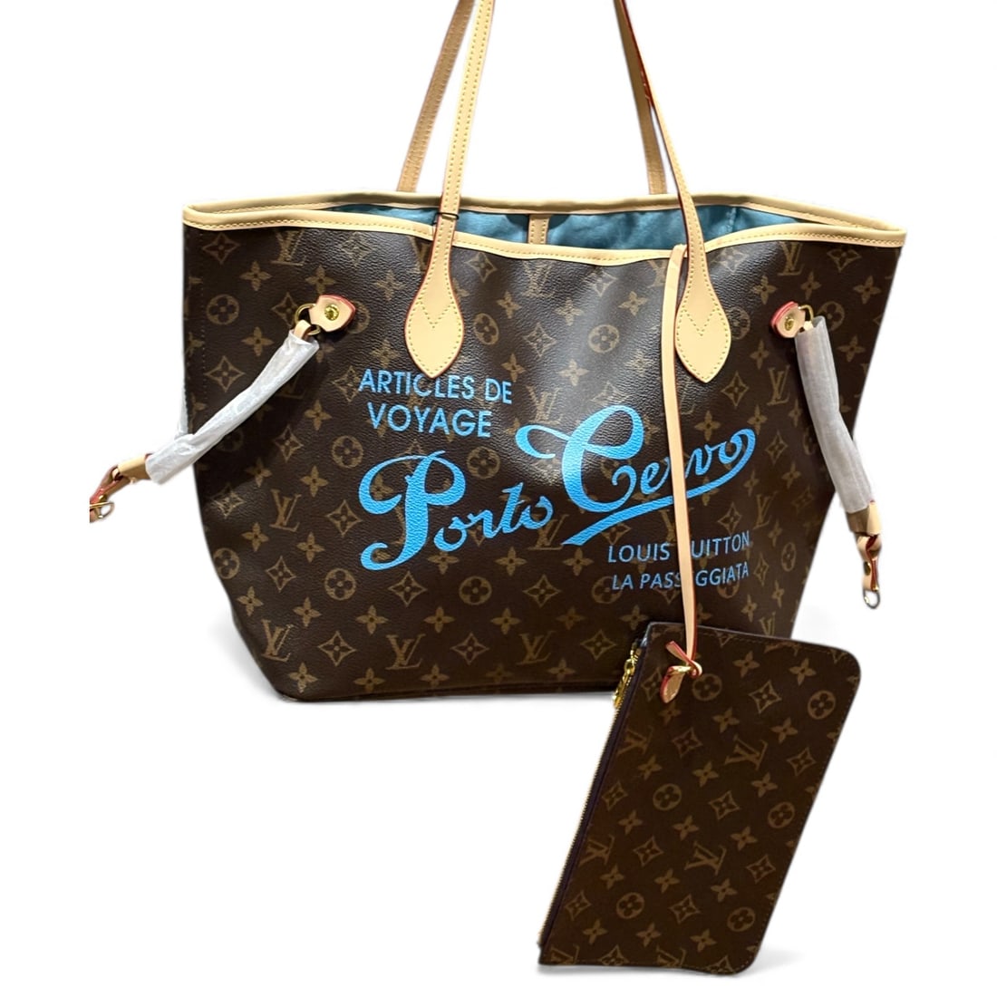 Louis Vuitton Brown Monogram/Blue Neverfull MM Beaute Bag, Matching Removable Pouch: • Louis Vuitton • Neverfull MM • Brown • Monogram Pattern • Interior: Blue • Blue Accents/Front Decoration • Double Handles • Interior Zip Pocket • Matchin