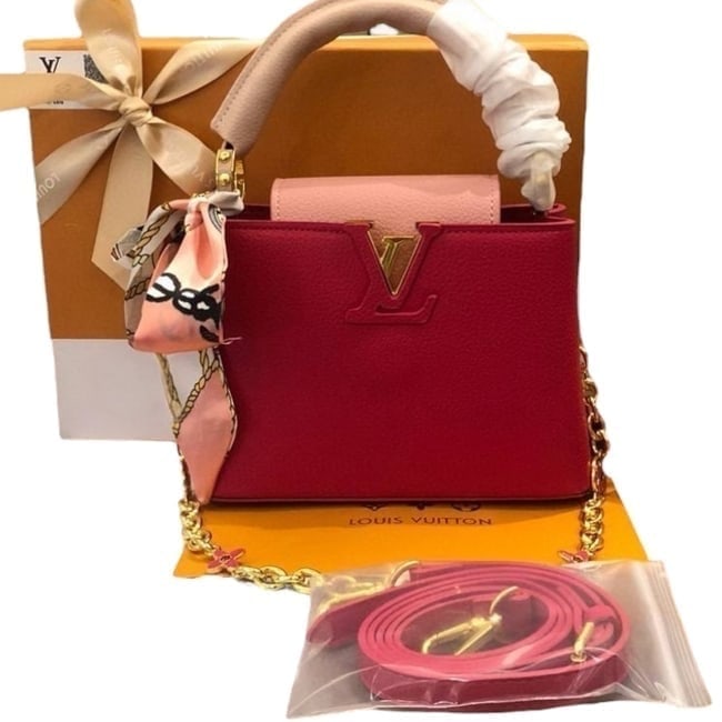 Louis Vuitton Red/Pink & Gold Capucines Beaute Bag & Original Box: • Louis Vuitton • Capucines • Red • Pink Accents • Gold Tone Hardware • Top Handle For Optional Carry • Removable Shoulder Strap Included • Magnetic Closure &bu