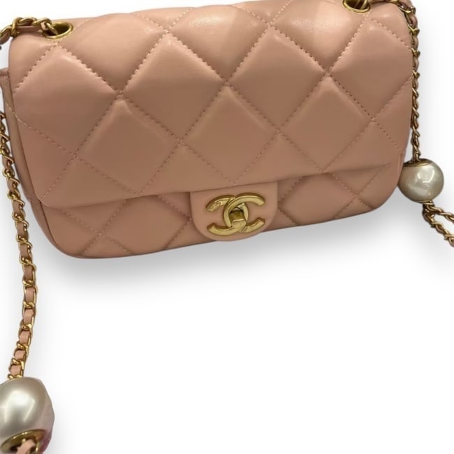 CHANEL Pink Pearl Crush CHANEL Flap Bag & Original Box: • CHANEL • Color: Coral • Single Flap Bag • Gold Tone Hardware • Quilted Pattern • Original Box Included • Dust Bag Included • Signature CC Twist Lock Closure &