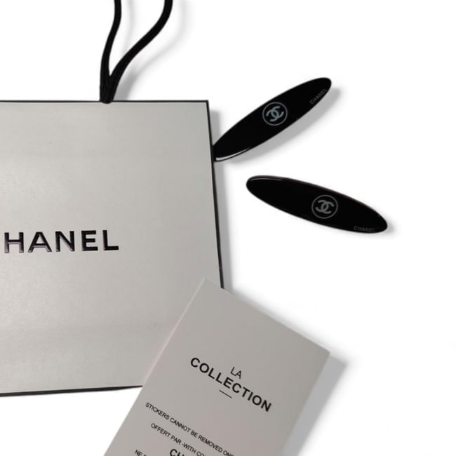 CHANEL 2Pc Lg Black/White CC Long Skinny Oval Hair Clips & Gift Bag: • CHANEL • 2Pc Set • Gabrielle • Hair Clips • Black • White Accents • CC Logo • Silver Tone Hardware • Shape: Long Skinny Oval • Size: Large • L.