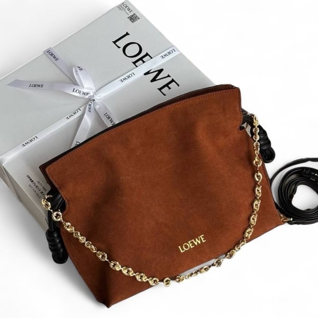Loewe Brown/Gold Flamenco Beaute Bag & Original Box: • Loewe • Style: Flamenco • Color: Brown • Material: Suede • Hardware: Gold Tone • Strap: Chain Strap, Black Removable Shoulder Strap Included • Logo: Front Logo &bu