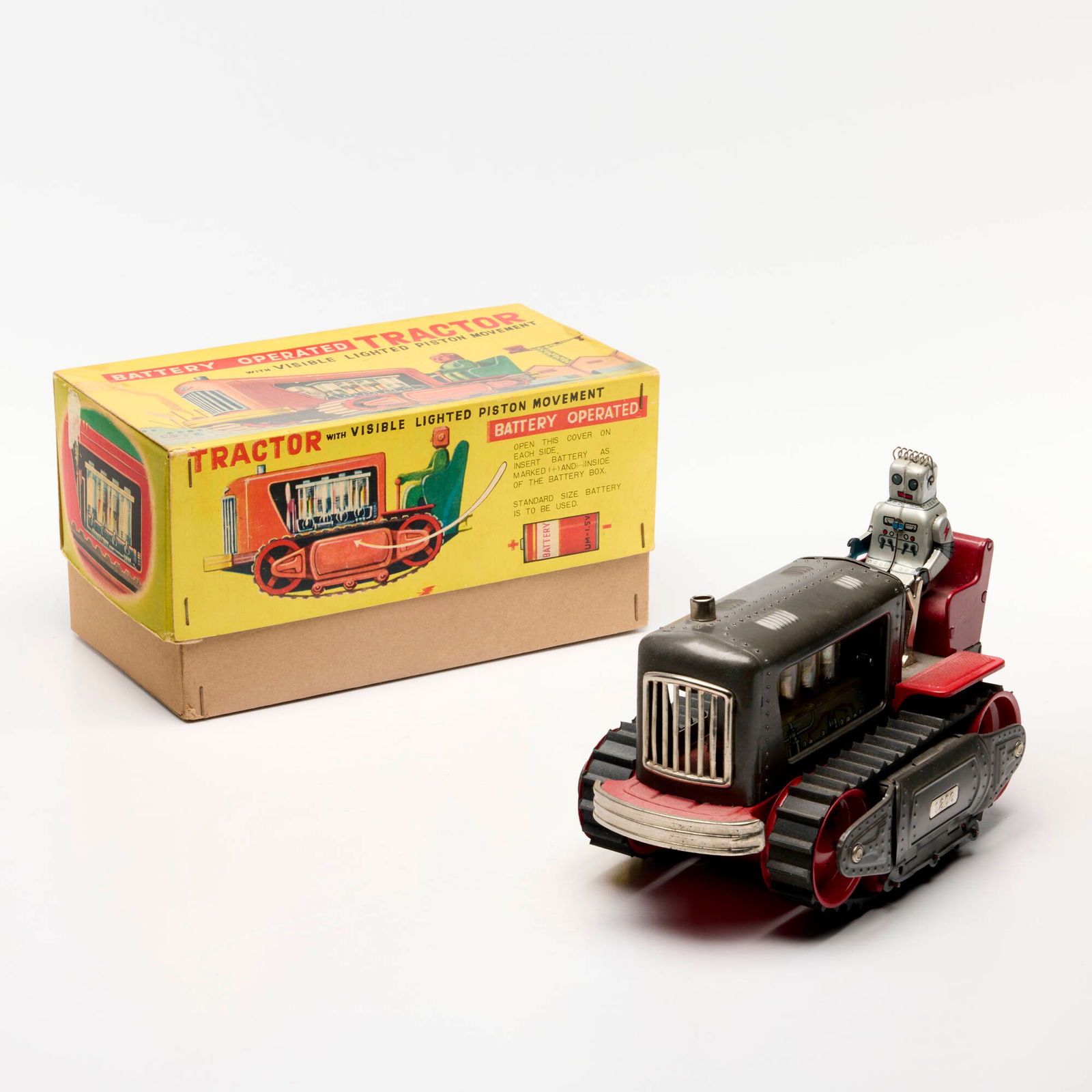 T.N Nomura Tin Battery-Operated Robot Tractor (1 of 3)