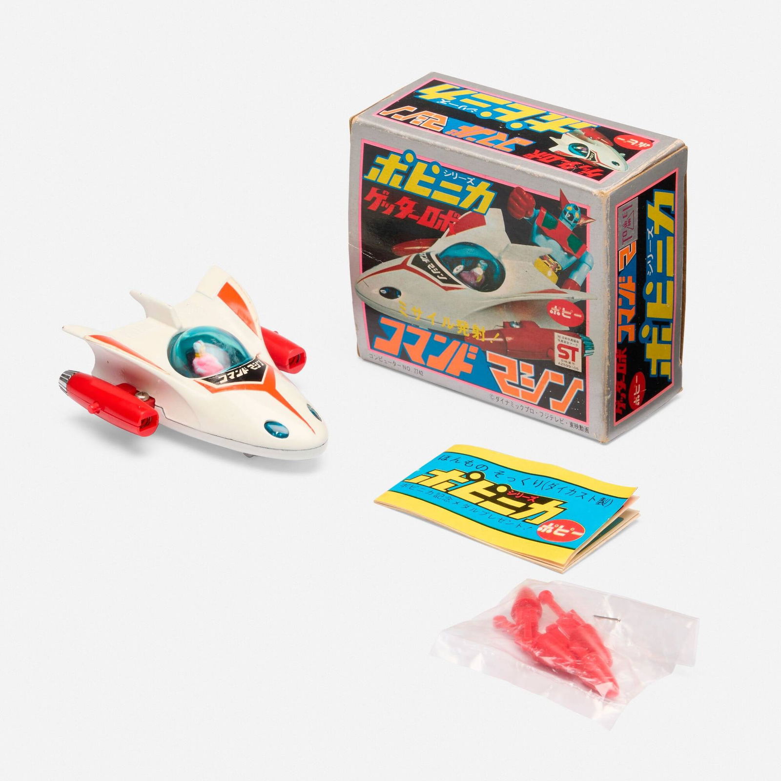 Popy Getter Robo Command Machine PA-29 Diecast Boxed: Popy Getter Robo Command Machine PA-29 Diecast Boxed Japan, 1974 box: 3.25 h x 3.5 w x 1.75 d in (8 x 9 x 4 cm) Condition Notes: Toy is complete and unused with factory sealed accessories. Box in exce