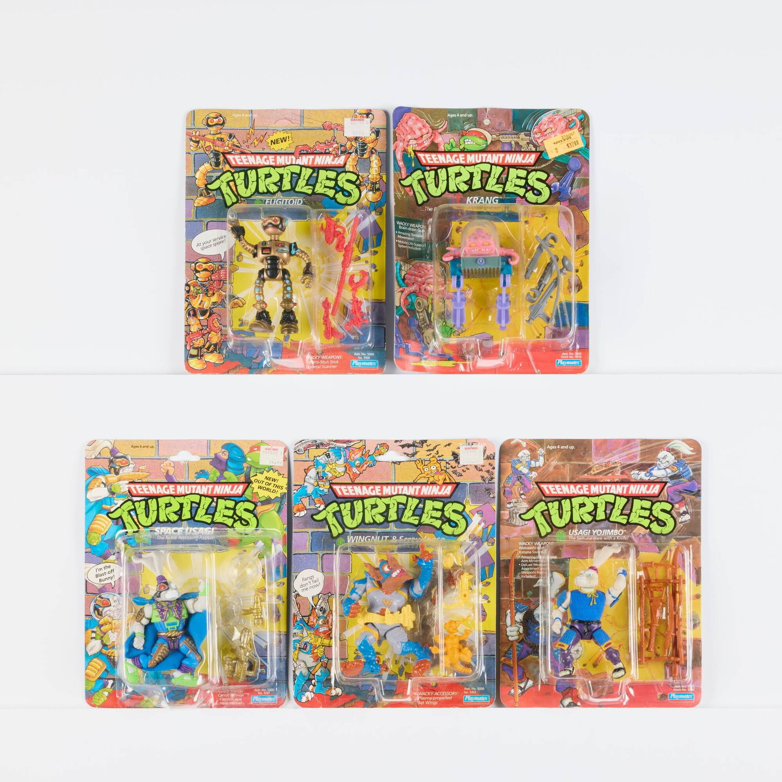 Four 1989-91 Playmates Teenage Mutant Ninja Turtles Factory Sealed Figure Group: Four 1989-91 Playmates Teenage Mutant Ninja Turtles Factory Sealed Figure Group USA, 1989-1991 Group includes 1989 Krang and Usagi Yojimbo, and 1990 Fugitoid and Wingnut, all factory sealed with light