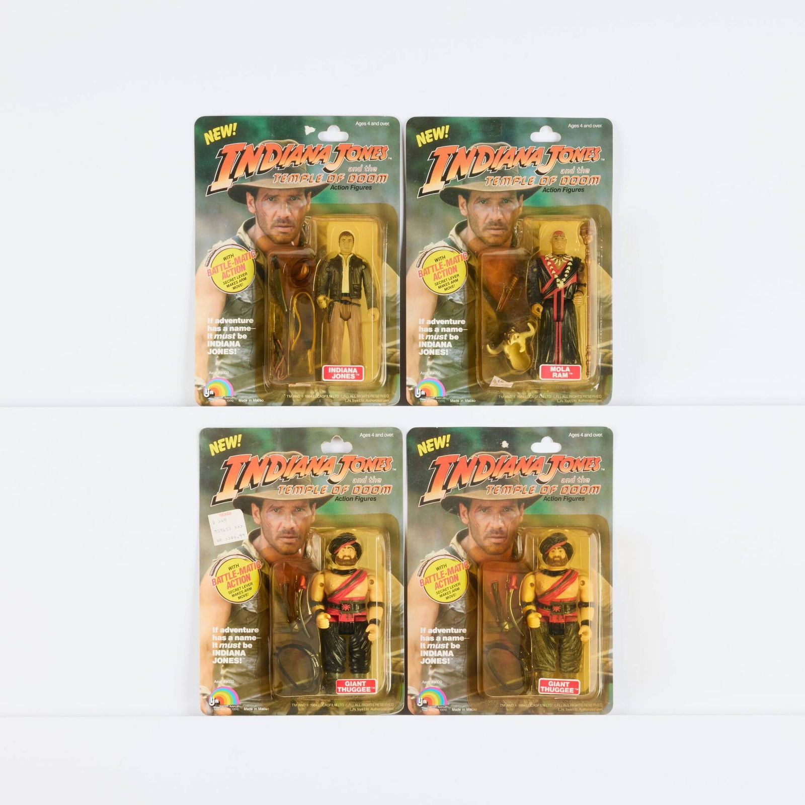 Four 1984 LJN Indiana Jones and the Temple of Doom Factory Sealed Figure Group: Four 1984 LJN Indiana Jones and the Temple of Doom Factory Sealed Figure Group USA, 1984 Group includes two Giant Thuggee, Indiana Jones, and Mola Ram. All factory sealed with light to moderate wear i