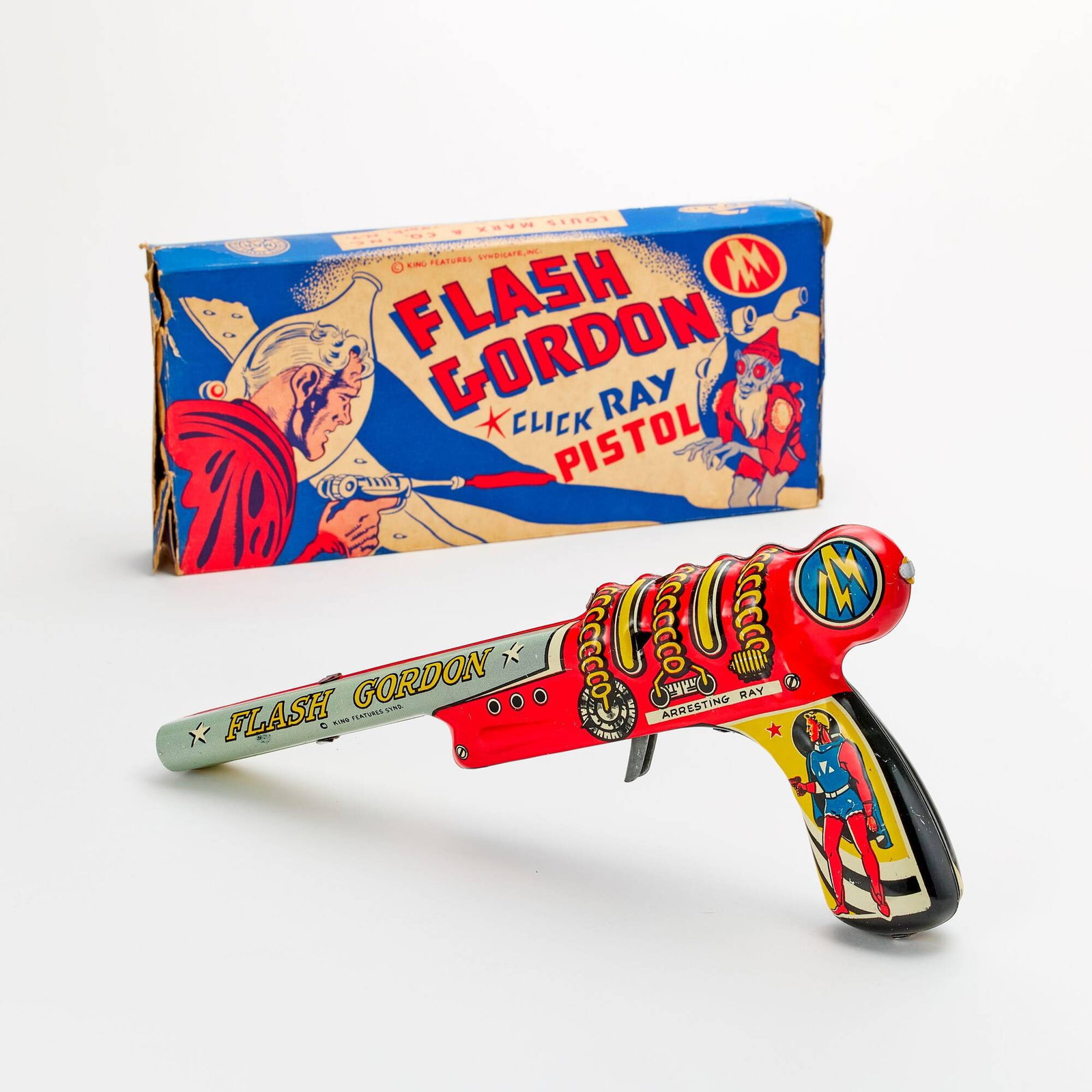 1952 Marx King Features Syndicate Flash Gordon Click Ray Pistol Boxed: 1952 Marx King Features Syndicate Flash Gordon Click Ray Pistol Boxed USA, 1952 Condition Notes: Toy C8+ with light wear including areas of scattered scratching, overall a beautiful toy with vibrant l