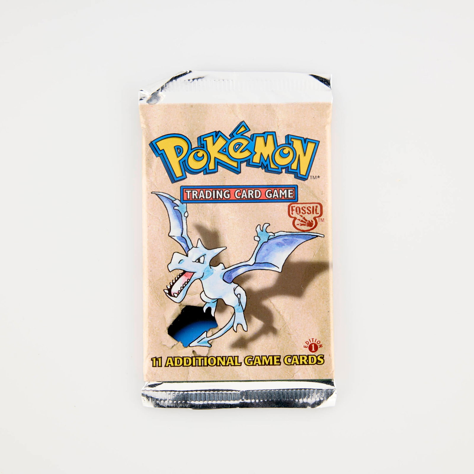 1999 Pokémon Fossil 1st Edition Booster Pack Factory Sealed: 1999 Pokémon Fossil 1st Edition Booster Pack Factory Sealed USA, 1999 Pack weighs 21.2 g and features Aerodactyl pack art. Back of pack has price sticker. This lot will ship from Millville, Massa