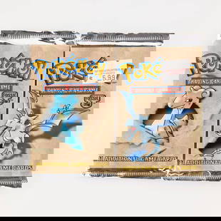 Two 1999 Pokémon Fossil Unlimited Booster Pack Factory Sealed Group: Two 1999 Pok&#233;mon Fossil Unlimited Booster Pack Factory Sealed Group USA, 1999 Features Lapras and Aerodactyl pack art. Pack Weight: Aerodactyl 21.1g, Lapras 21.4g This lot