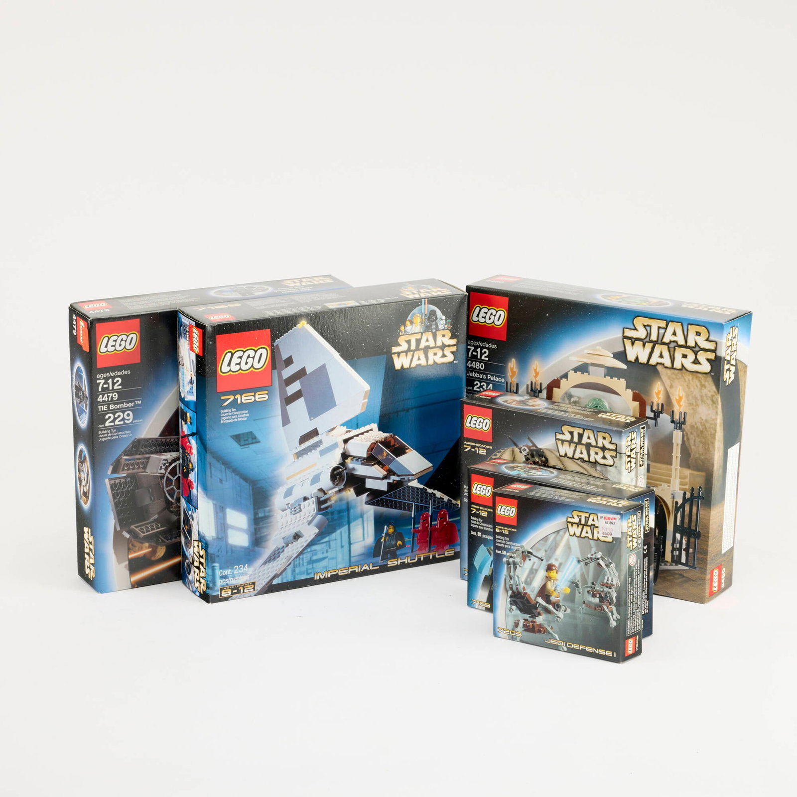 6PC 2001-03 LEGO Star Wars Group Factory Sealed: 6PC 2001-03 LEGO Star Wars Group Factory Sealed USA, 2001-03 Group includes: 2001 Imperial Shuttle 7166 2002 Jedi Duel 7103 2002 Jedi Defense I 7203 2002 Ewok Attack 7139 2003 The Bomber 4479 2003 Jab