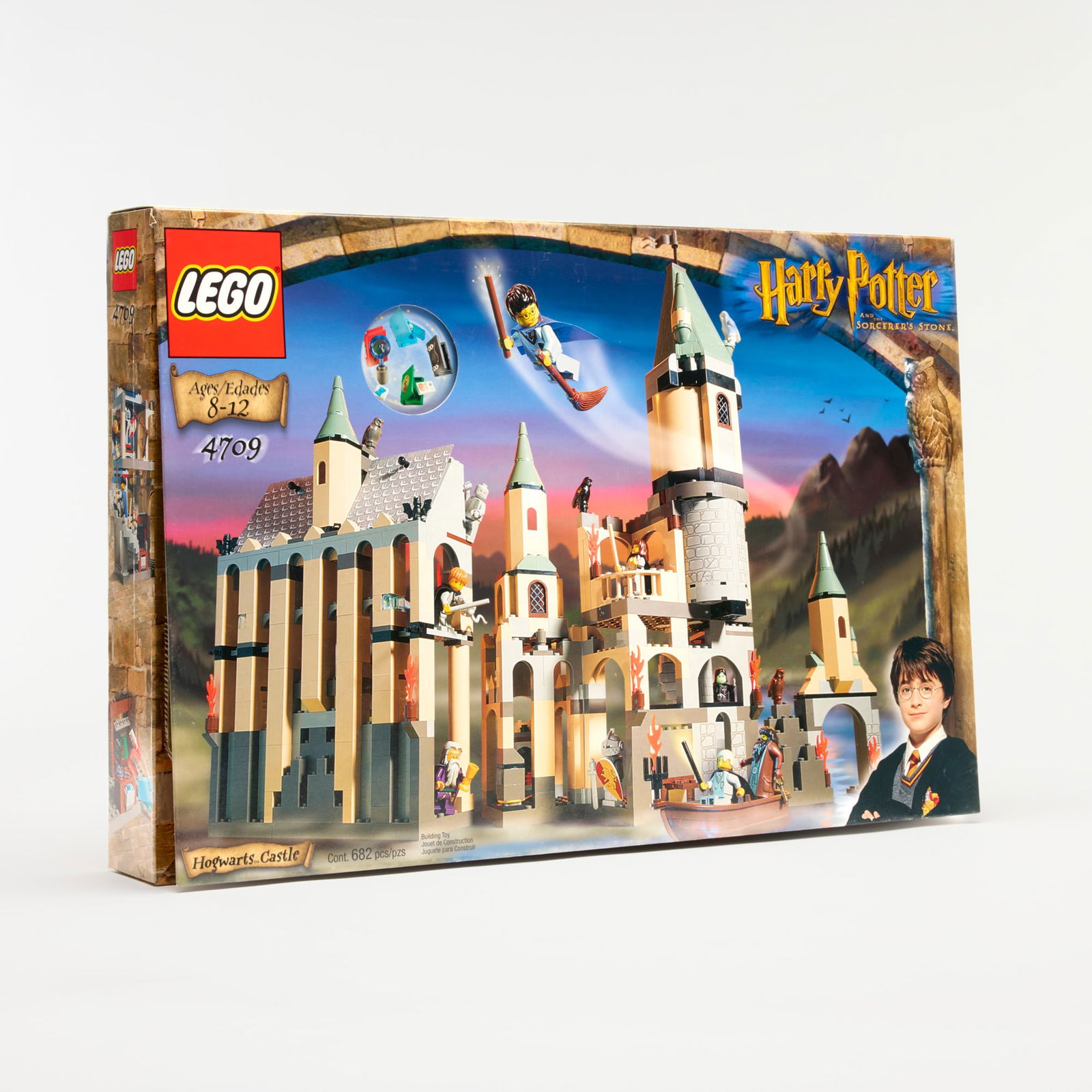 2001 LEGO Harry Potter and the Sorcerer's Stone Hogwarts Castle 4709 Factory Sealed: 2001 LEGO Harry Potter and the Sorcerer's Stone Hogwarts Castle 4709 Factory Sealed USA, 2001 22.5 h x 15 w x 3 d in (57 x 38 x 8 cm) Set contains 890 pieces and nine mini figures: Albus Dumbledore, D