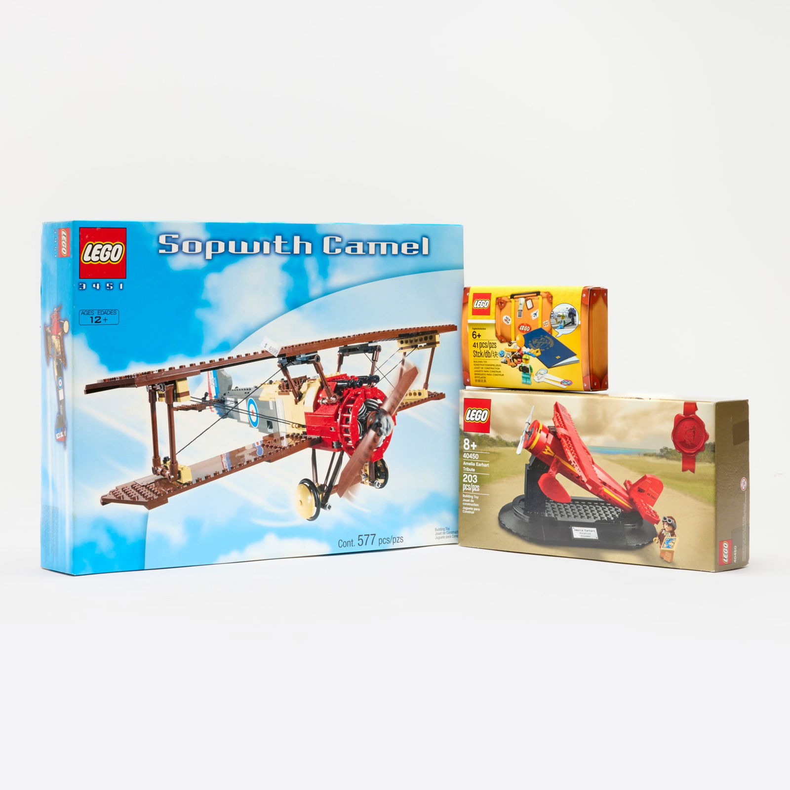 3PC 2001-21 LEGO Airplane Related Group Factory Sealed: 3PC 2001-21 LEGO Airplane Related Group Factory Sealed USA, 2001-21 Factory Sealed group contains:2001 Sopwith Camel 3451 (577 pieces)2017 Travel Building Suitcase 5004932 (41 pieces with one mini fig