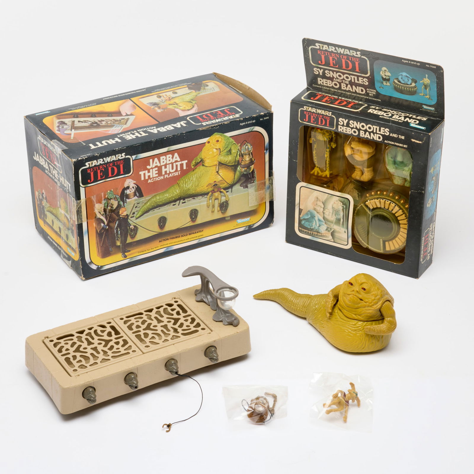 2PC 1983 Kenner Star Wars Return of the Jedi Jabba The Hutt Action Playset and Sy Snootles: 2PC 1983 Kenner Star Wars Return of the Jedi Jabba The Hutt Action Playset and Sy Snootles and the Rebo Band Action Figure Set Group USA, 1983 Factory Sealed group includes: 1983 Kenner Star Wars Retu