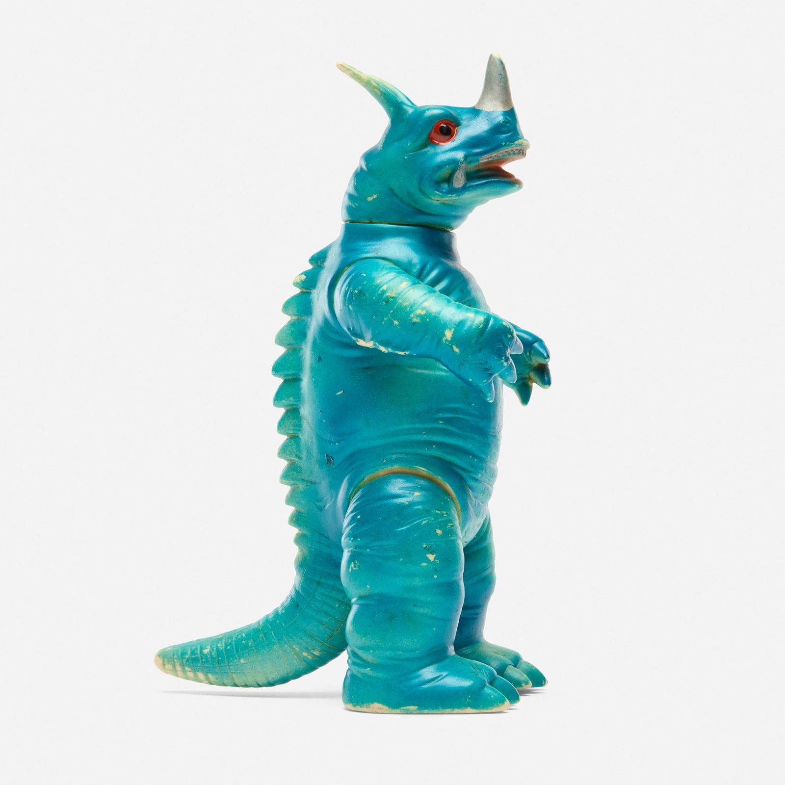 Marusan Ultraman Neronga Standard Vinyl: Marusan Ultraman Neronga Standard Vinyl MarusanJapan, c. 1960 8.7 h x 4.7 w x 5.5 d in (22 x 12 x 14 cm) Early production example with blue spray on ivory vinyl. Condition Notes: Overall g