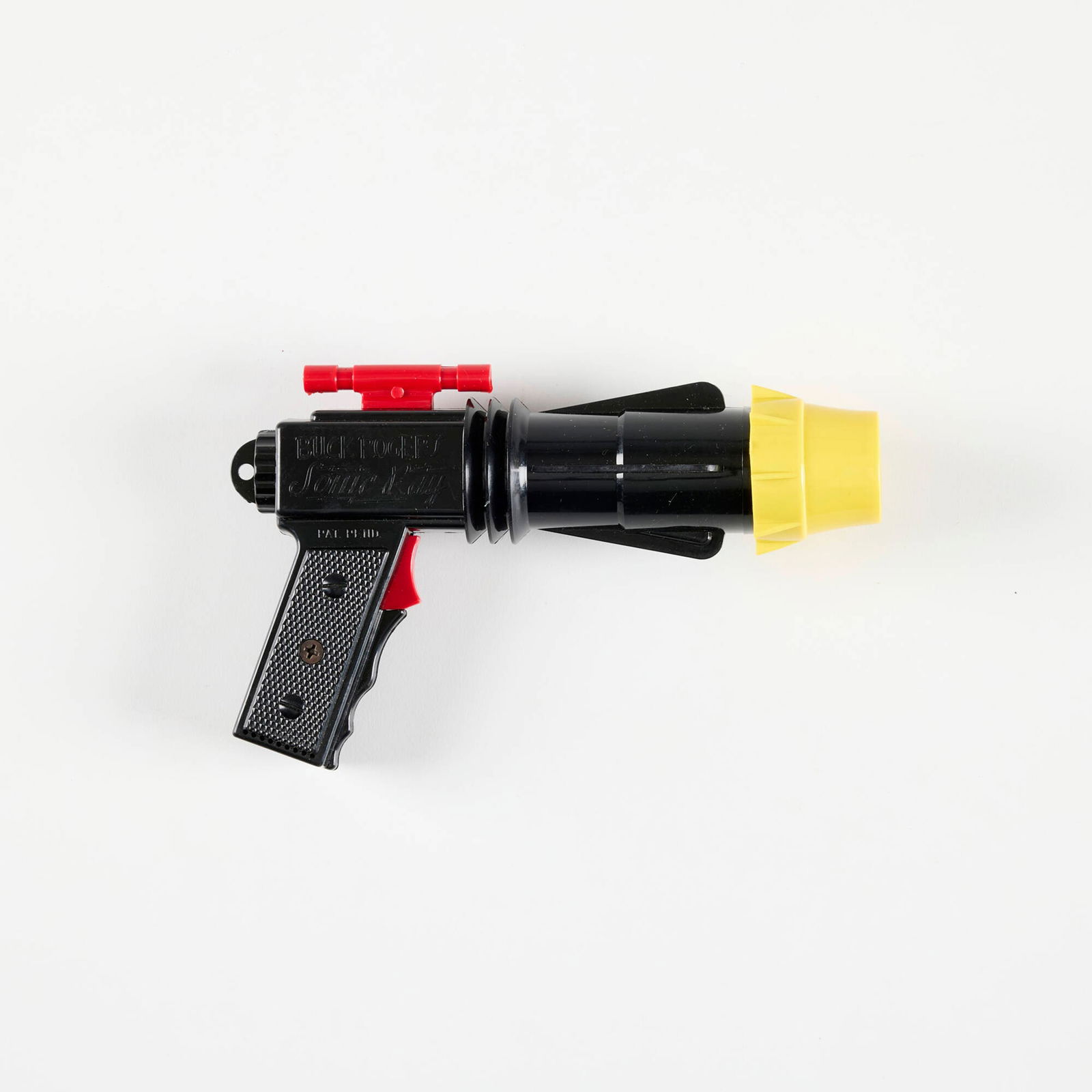 Commonwealth Utilities Co. Buck Rogers Sonic Ray Gun with Original Box: Commonwealth Utilities Co. Buck Rogers Sonic Ray Gun with Original Box molded plastic 4.75 h x 7.5 w x 2 d in (12 x 19 x 5 cm) Sold with original packaging and four original batteries. Manufacturer's