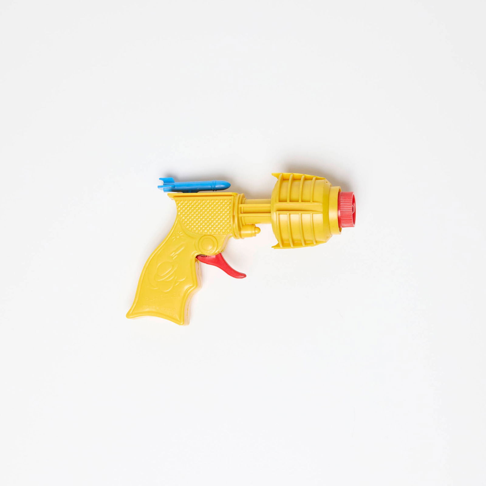 Renwal Planet Jet Yellow Ray Gun: Renwal Planet Jet Yellow Ray Gun molded plastic 4 h x 5.75 w x 2 d in (10 x 15 x 5 cm) Molded manufacturer's mark to handle. Condition Notes: Good condition. Minimal wear exists throughout the p