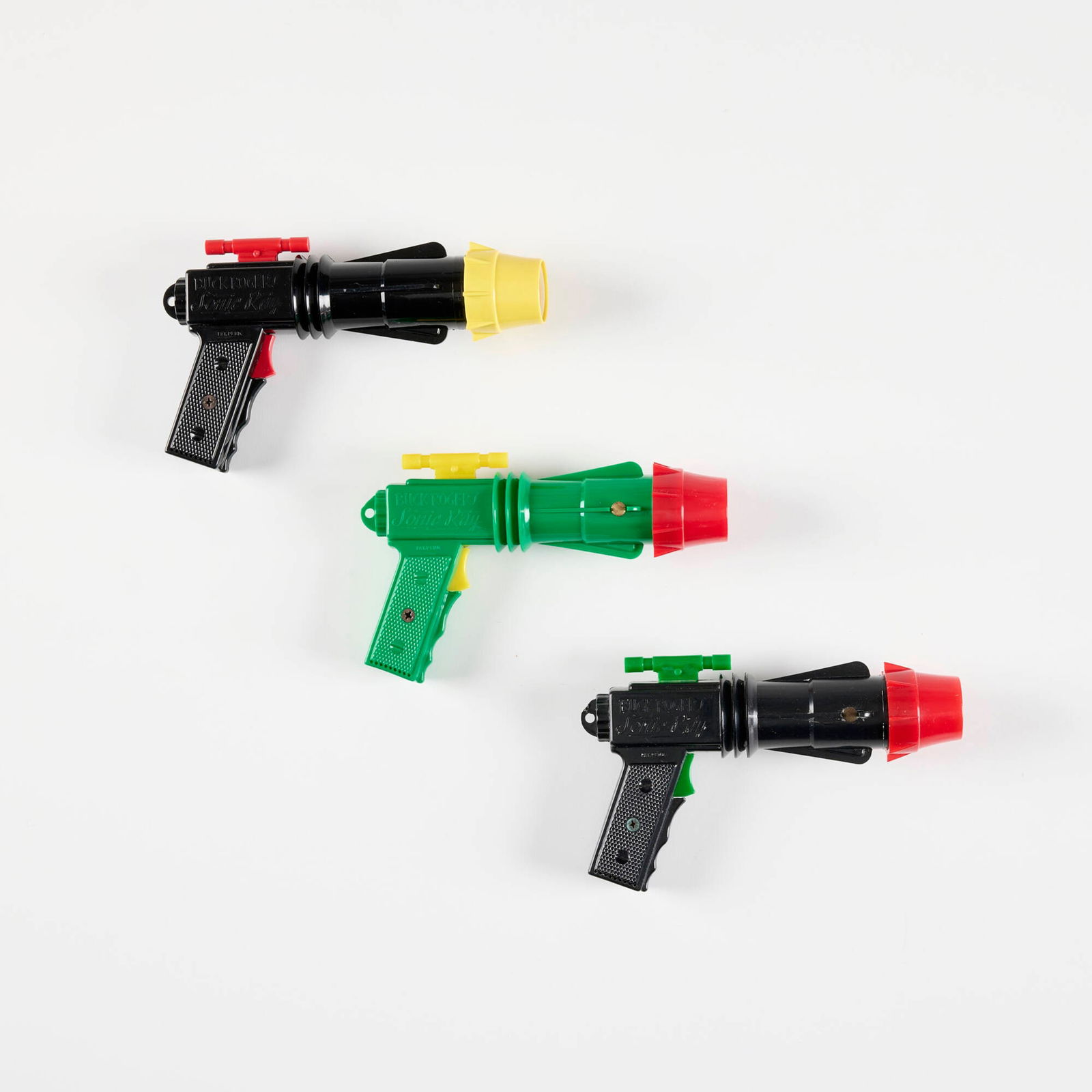 Three Commonwealth Utilities Co. Buck Rogers Sonic Ray Gun: Three Commonwealth Utilities Co. Buck Rogers Sonic Ray Gun molded plastic 4.75 h x 7.5 w x 2 d in (12 x 19 x 5 cm) One with original box. Manufacturer's mark to each example. Condition Notes: Ve