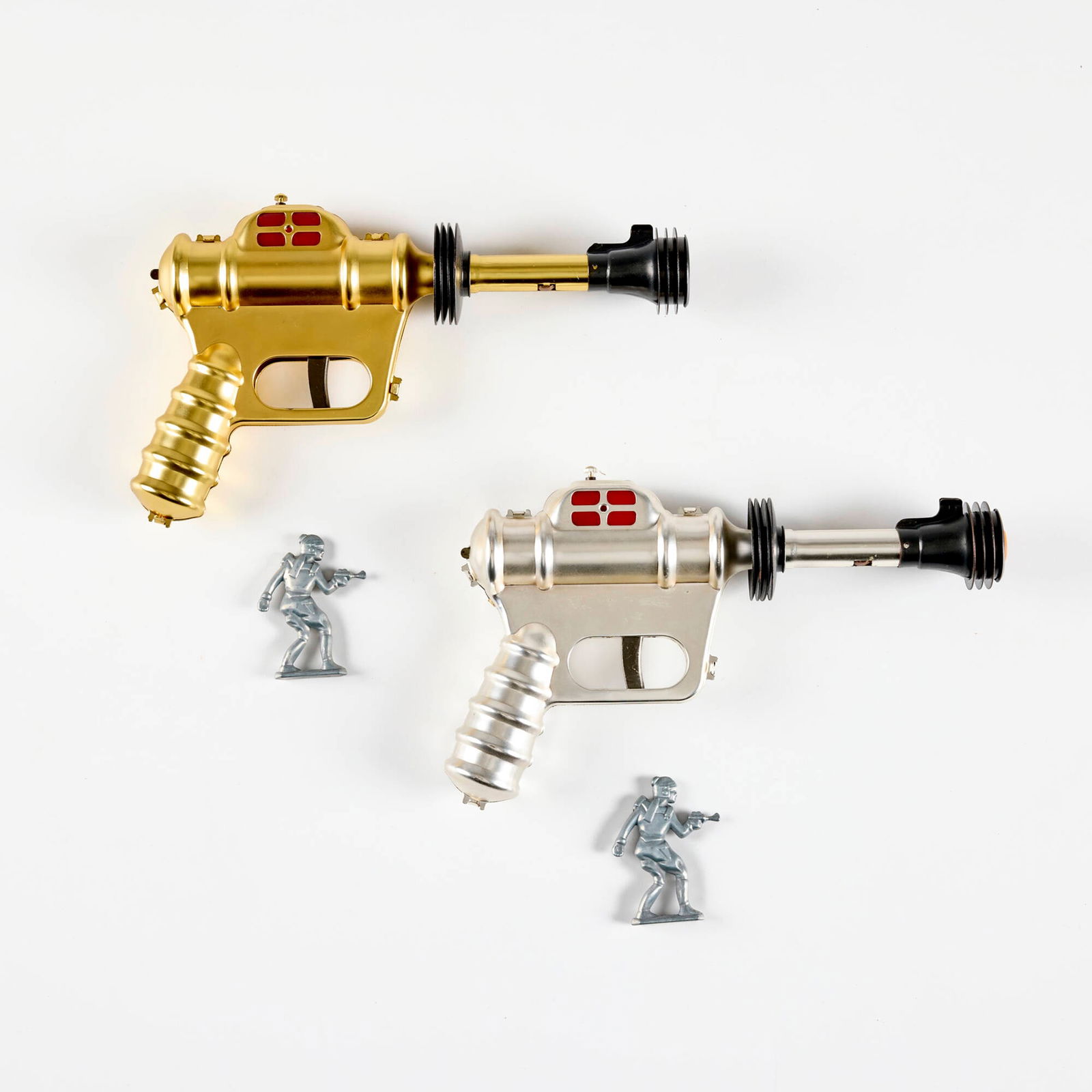 Two Go Hero Limited Edition Buck Rogers Disintegrator Pistols: Two Go Hero Limited Edition Buck Rogers Disintegrator Pistols Go HeroUSA, 2008gold-plated metal, silver-plated metal, patinated metal 6 h x 10.25 w x 1.875 d in (15 x 26 x 5 cm) One silver the other g
