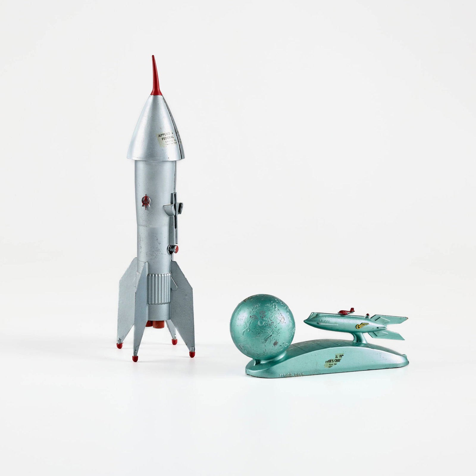 Two Cast Metal Space Age Toy Banks (1 of 3)