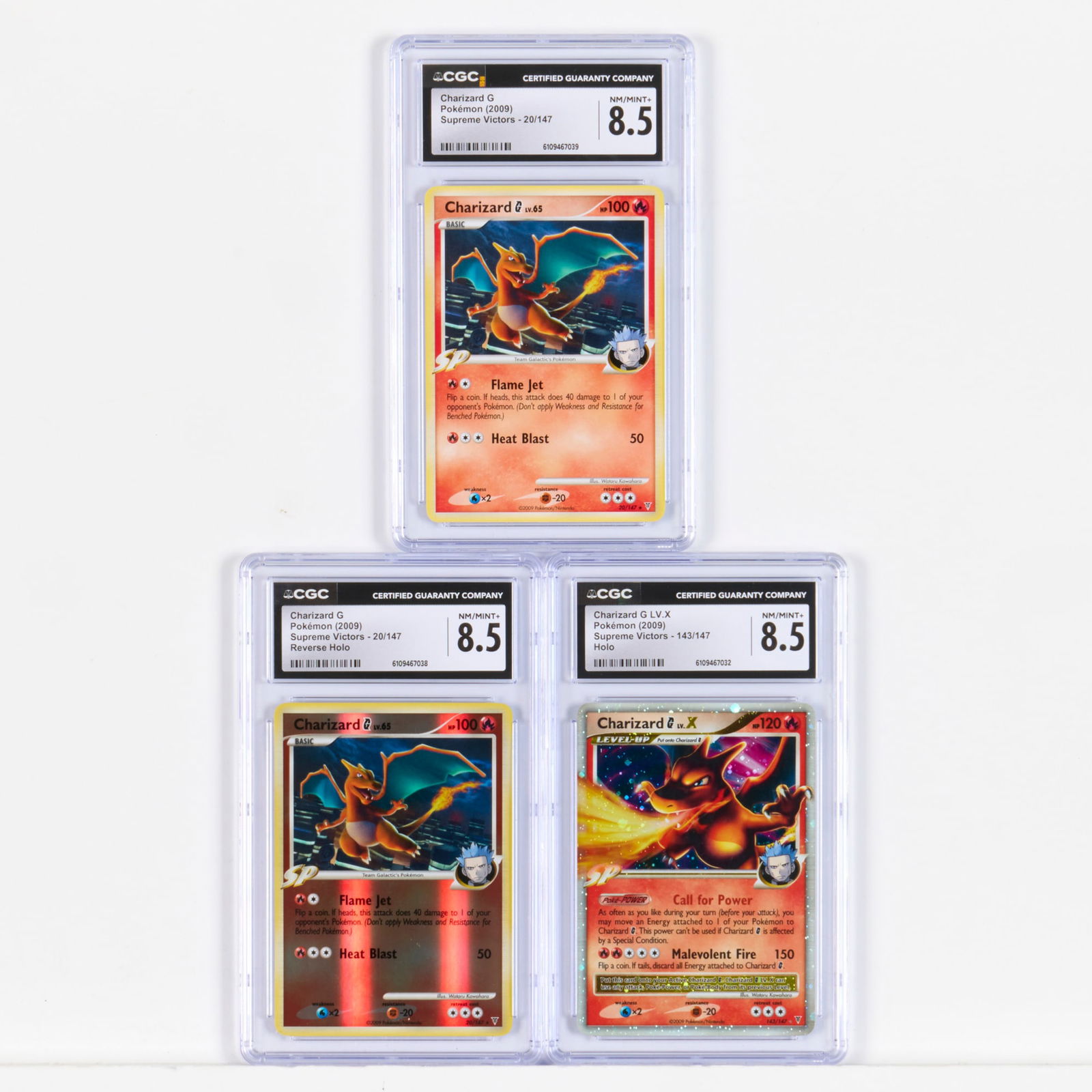 Three 2009 Pokemon Supreme Victors Charizard G CGC 8.5 Trading Card Group (1 of 2)