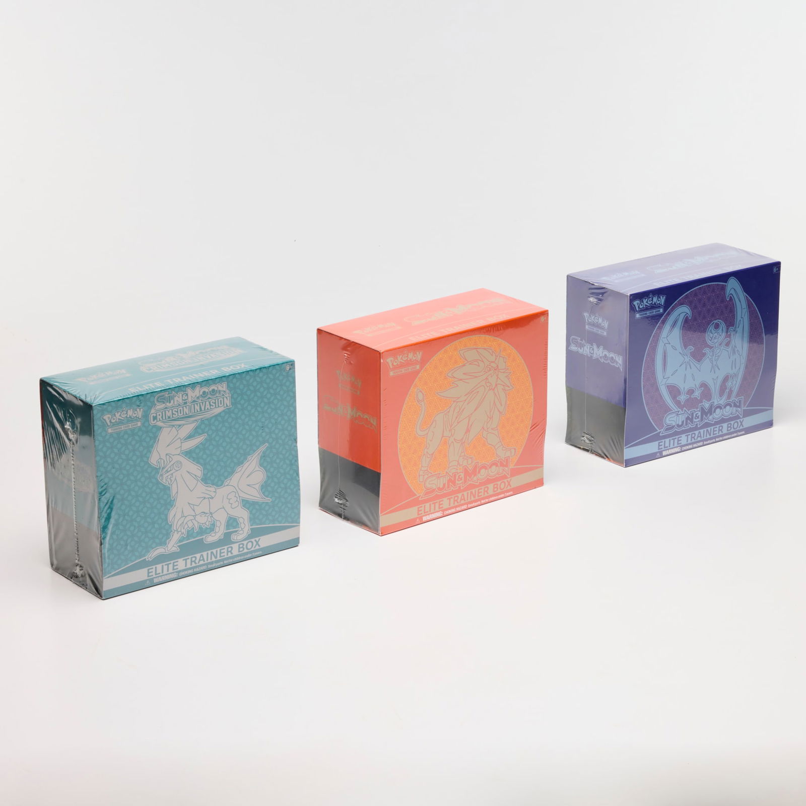 Three 2017 Pokemon Sun & Moon Base and Crimson Invasion Elite Trainer Box Group Factory Sealed: Three 2017 Pokemon Sun & Moon Base and Crimson Invasion Elite Trainer Box Group Factory Sealed USA, 2017 Group includes: 2017 Sun & Moon Elite Trainer Box [Solgaleo], 2017 Sun & Moon Elite Trainer Box