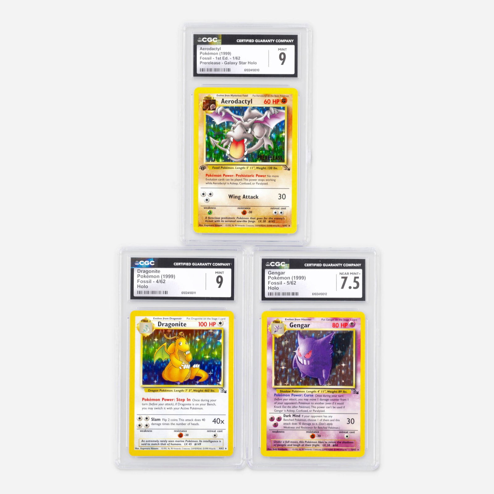 Three 1999 Pokemon Fossil Holo CGC Trading Card Group: Three 1999 Pokemon Fossil Holo CGC Trading Card Group USA, 1999 1999 Pokemon Fossil 1st Edition 1/62 Aerodactyl Prerelease Galaxy Star Holo Trading Card CGC 9 CGC#: 6102410010