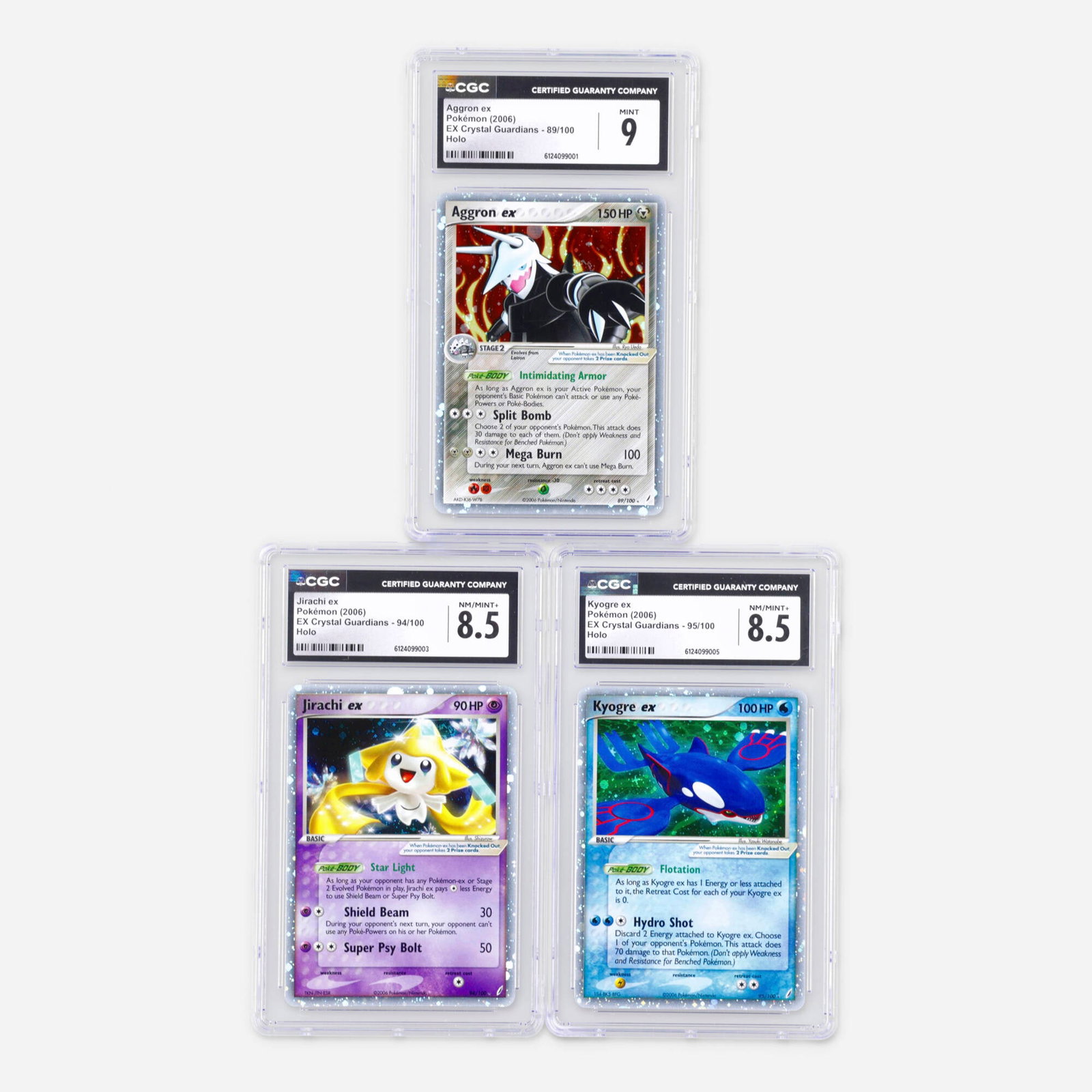 Three 2006 Pokemon EX Crystal Guardians ex Holo CGC Trading Card Group: Three 2006 Pokemon EX Crystal Guardians ex Holo CGC Trading Card Group USA, 2006 2006 Pokemon EX Crystal Guardians 89/100 Aggron ex Holo Trading Card CGC 9 CGC#: 6124099001