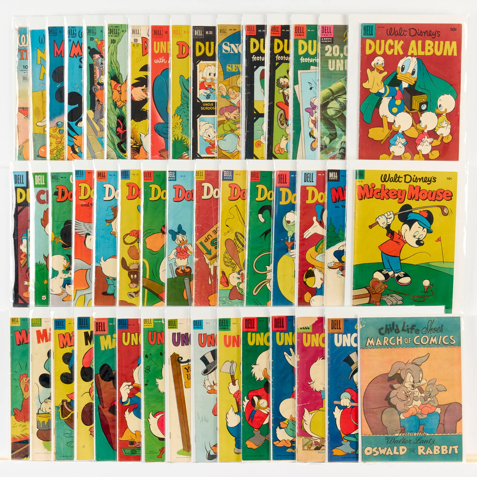 46 Dell Publishing Mixed Title Group: 46 Dell Publishing Mixed Title Group USA, 20th Century Group includes: Dell Publishing Chip 'n' Dale #4 (4.0-6.0); Donald Duck #26, #27, #29-#32 (Grades range 3.0-5.0), #34 (1.5-1.8), #36,