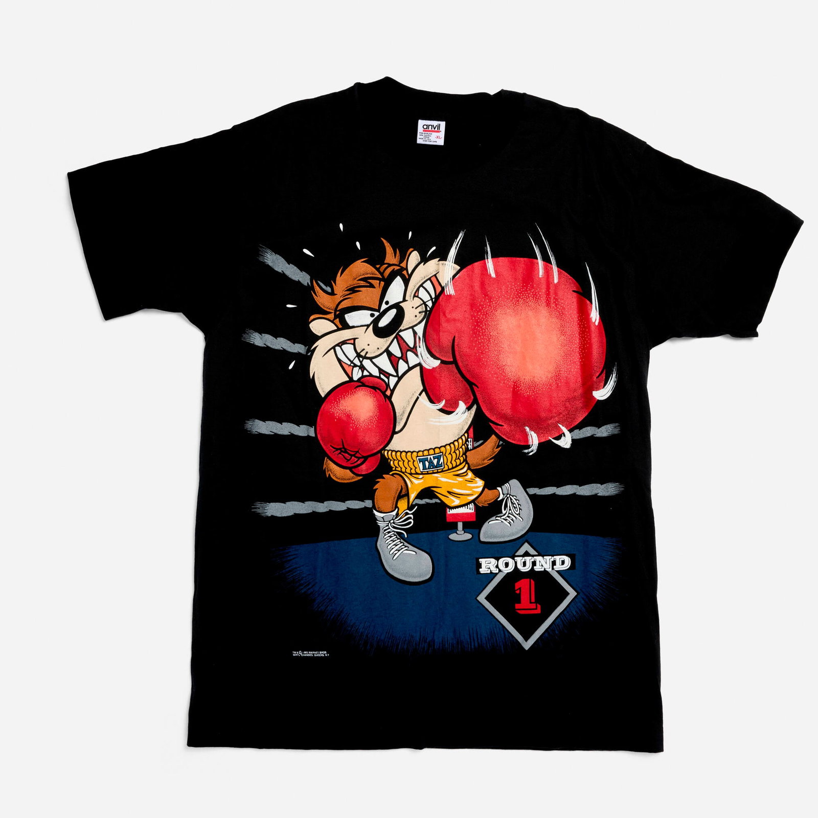 Taz Tasmanian Devil Boxing X-Large T-Shirt: Taz Tasmanian Devil Boxing X-Large T-Shirt 1993 100% cotton, single stitch 22 w x 28.5 l in (56 x 72 cm) Condition Notes: Overall good vintage condition with minimal wear consistent with age, ful