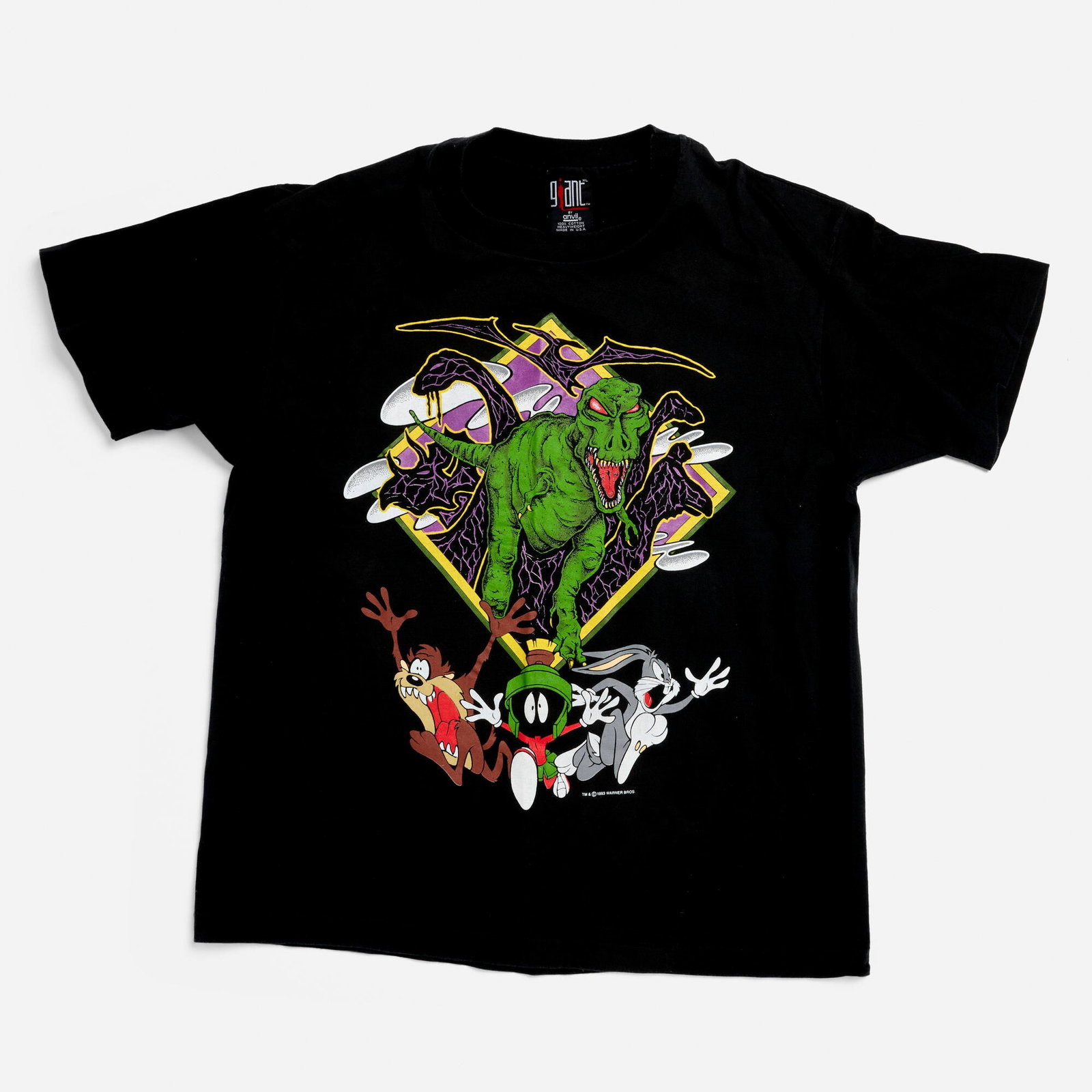 Looney Tunes Jurassic T-Rex X-Large T-Shirt Single Stitch: Looney Tunes Jurassic T-Rex X-Large T-Shirt Single Stitch 1993 100% cotton, single stitch 21 w x 24 l in (53 x 61 cm) Condition Notes: Small 4 mm x 2 mm pinhole under left pit under hem. Approxima