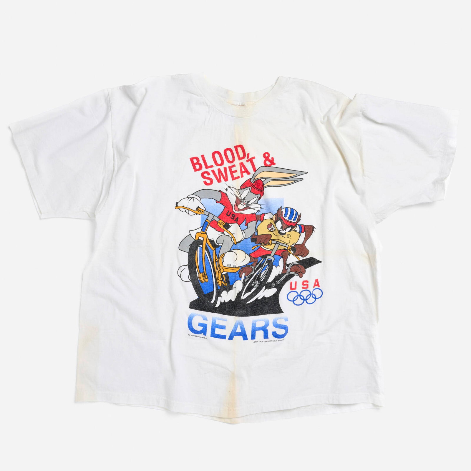 Olympics 1996 Bugs Bunny and Taz Tasmanian Devil Blood, Sweat & Gears XXL T-Shirt Single Stitch: Olympics 1996 Bugs Bunny and Taz Tasmanian Devil Blood, Sweat & Gears XXL T-Shirt Single Stitch 1995 100% cotton, single stitch 24 w x 25 l in (61 x 63 cm) Condition Notes: Some staining/yellowing