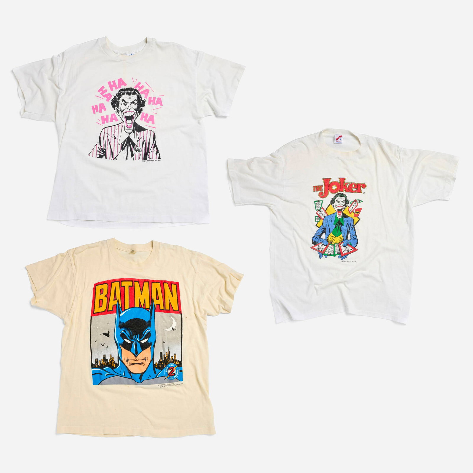 3 Vintage DC Comics Batman and The Joker X-Large T-Shirt Group: 3 Vintage DC Comics Batman and The Joker X-Large T-Shirt Group 50% cotton 50% polyester, double stitch; 50% cotton 50% polyester, single stitch; 50% cotton 50% polyester, single stitch laughing: 20.5 
