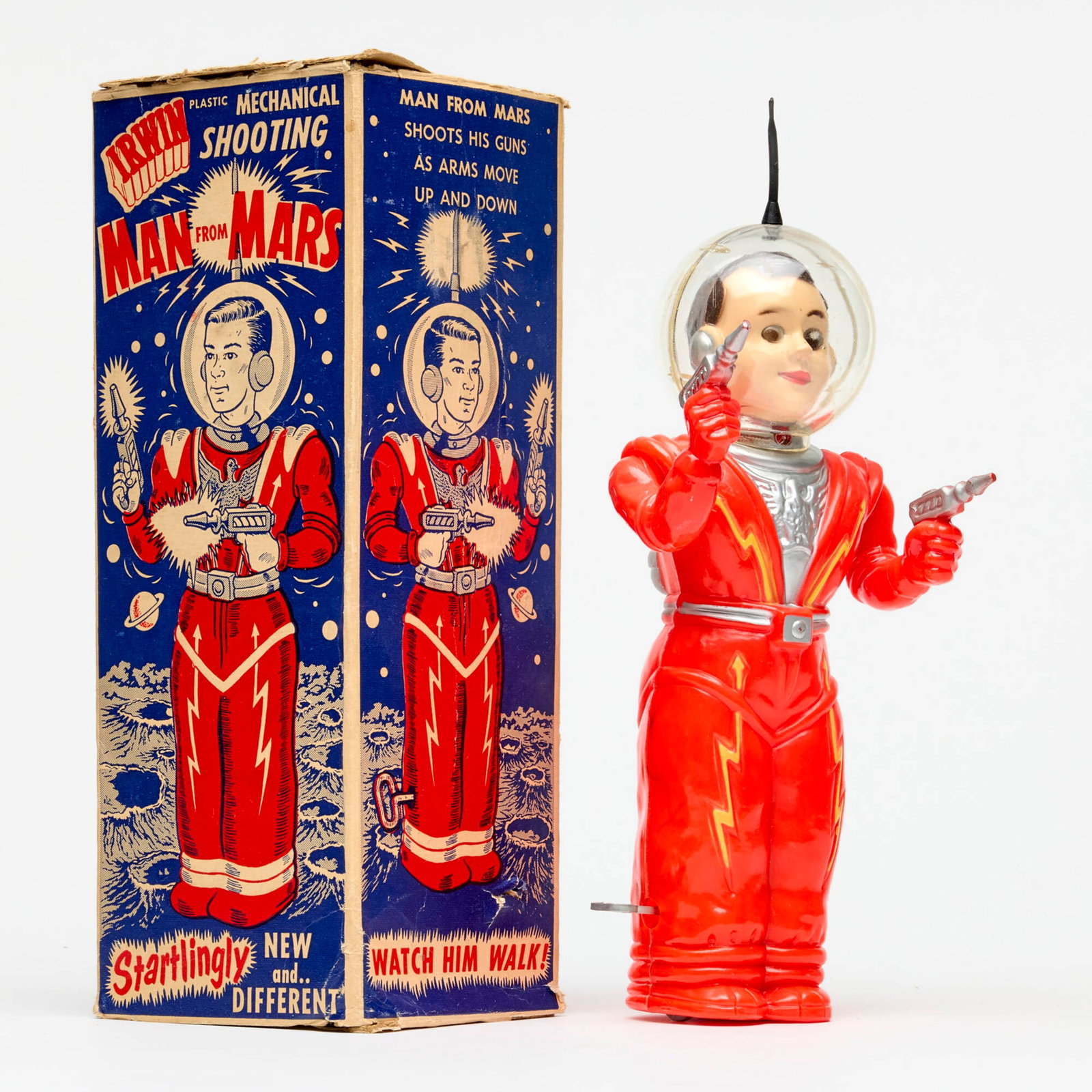 1952 Irwin Plastic Mechanical Shooting Man From Mars Boxed: 1952 Irwin Plastic Mechanical Shooting Man From Mars Boxed USA, 1952 11.5 h x 4.25 w x 3.75 d in (29 x 11 x 10 cm) Condition Notes: In good condition, helmet with some areas of scuffing. Box with only