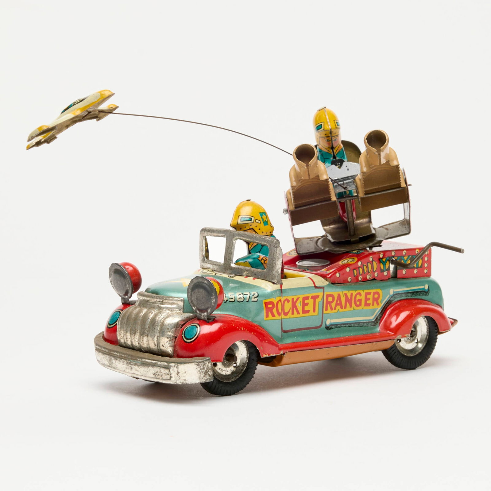 Marusan Rocket Ranger with F-22 Tin Friction Truck: Marusan Rocket Ranger with F-22 Tin Friction Truck Japan 5.25 h x 3 w x 6.25 d in (13 x 8 x 16 cm) Condition Notes: Wear with light oxidation to exposed metal at fender, grill and windshield as expect