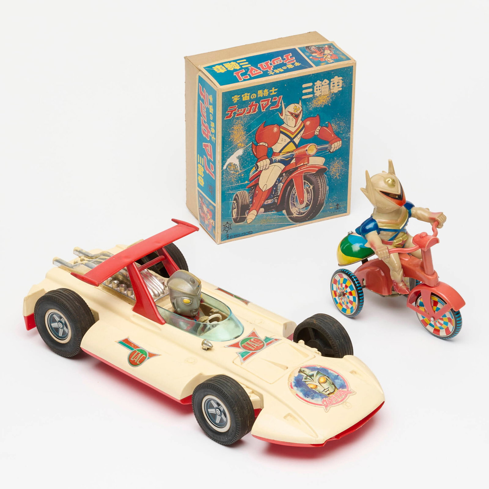2PC Tatsunoko Production Yonezawa Toys Tekkaman: 2PC Tatsunoko Production and Yonezawa Toys Tekkaman: Space Knight Tricycle and Ultraman Taro Sigma Grand Prix Race Car Group Japan 7.5 h x 6.5 w x 3.75 d in (19 x 17 x 10 cm) 4 h x 7 w x 15.5 d in (10