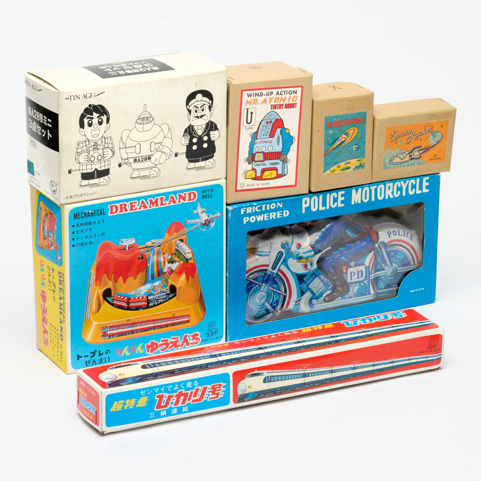 7PC Japanese Tin Wind-Up Boxed Toy Group: 7PC Japanese Tin Wind-Up Boxed Toy Group Japan smallest: 3.75 h x 2.5 w x 1.5 d in (10 x 6 x 4 cm) longest: 2.25 h x 13 w x 1.5 d in (6 x 33 x 4 cm) Group includes: Friction Powered Police Motorcycle,