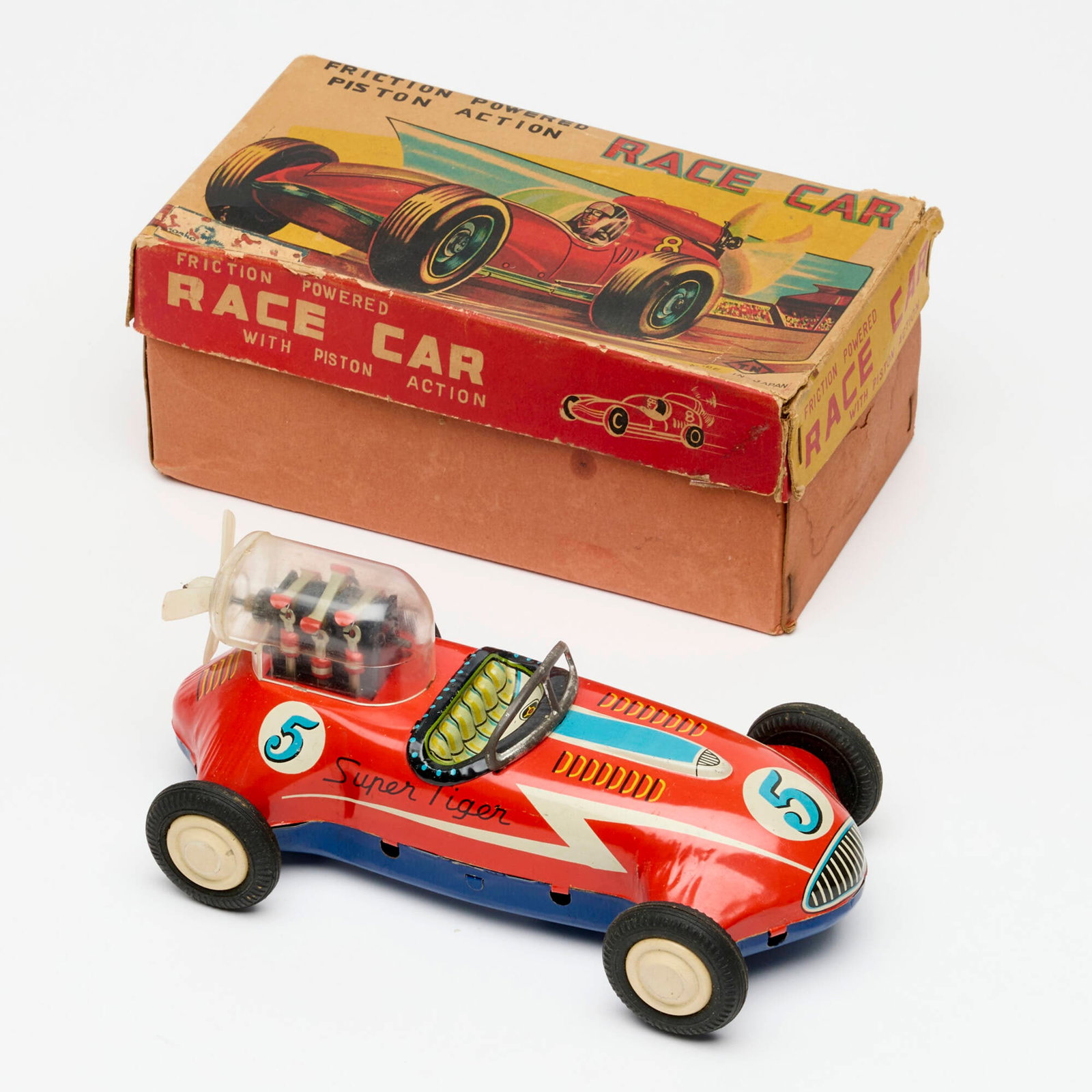 TN Nomura Tin Friction Piston Action Race Car Boxed: TN Nomura Tin Friction Piston Action Race Car Boxed USA 4.25 h x 7.75 w x 3 d in (11 x 20 x 8 cm) Working pistons.Condition Notes: Complete in box. Near unused condition with minimal wear to diecast f