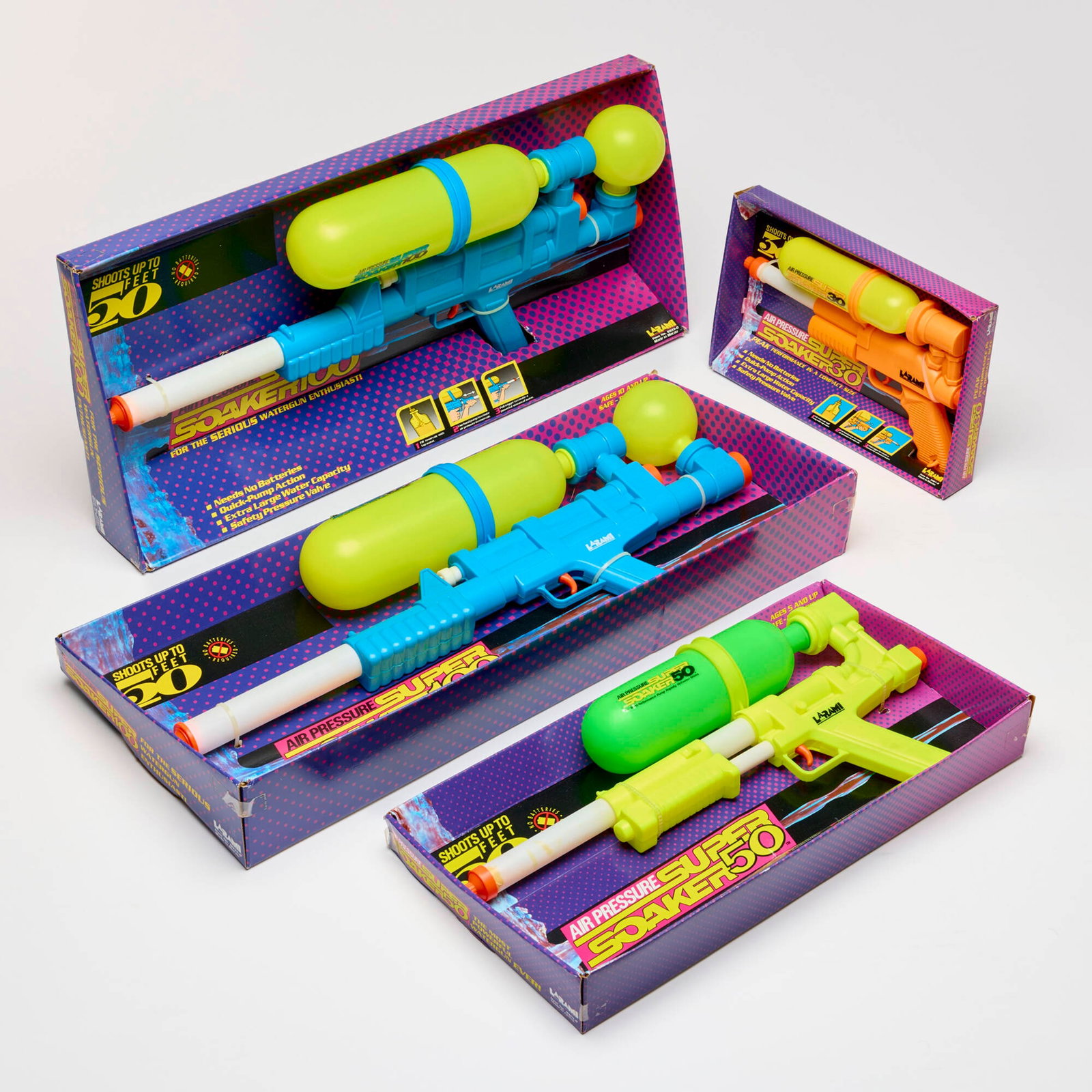 4PC 1990 Larami Air Pressure Super Soaker Group Factory Sealed: 4PC 1990 Larami Air Pressure Super Soaker Group Factory Sealed USA, 1990 8 h x 12.5 w x 2 d in (20 x 32 x 5 cm) 10 h x 19.5 w x 2.5 d in (25 x 50 x 6 cm) 11.75 h x 27 w x 3.75 d in (30 x 69 x 10 cm) G