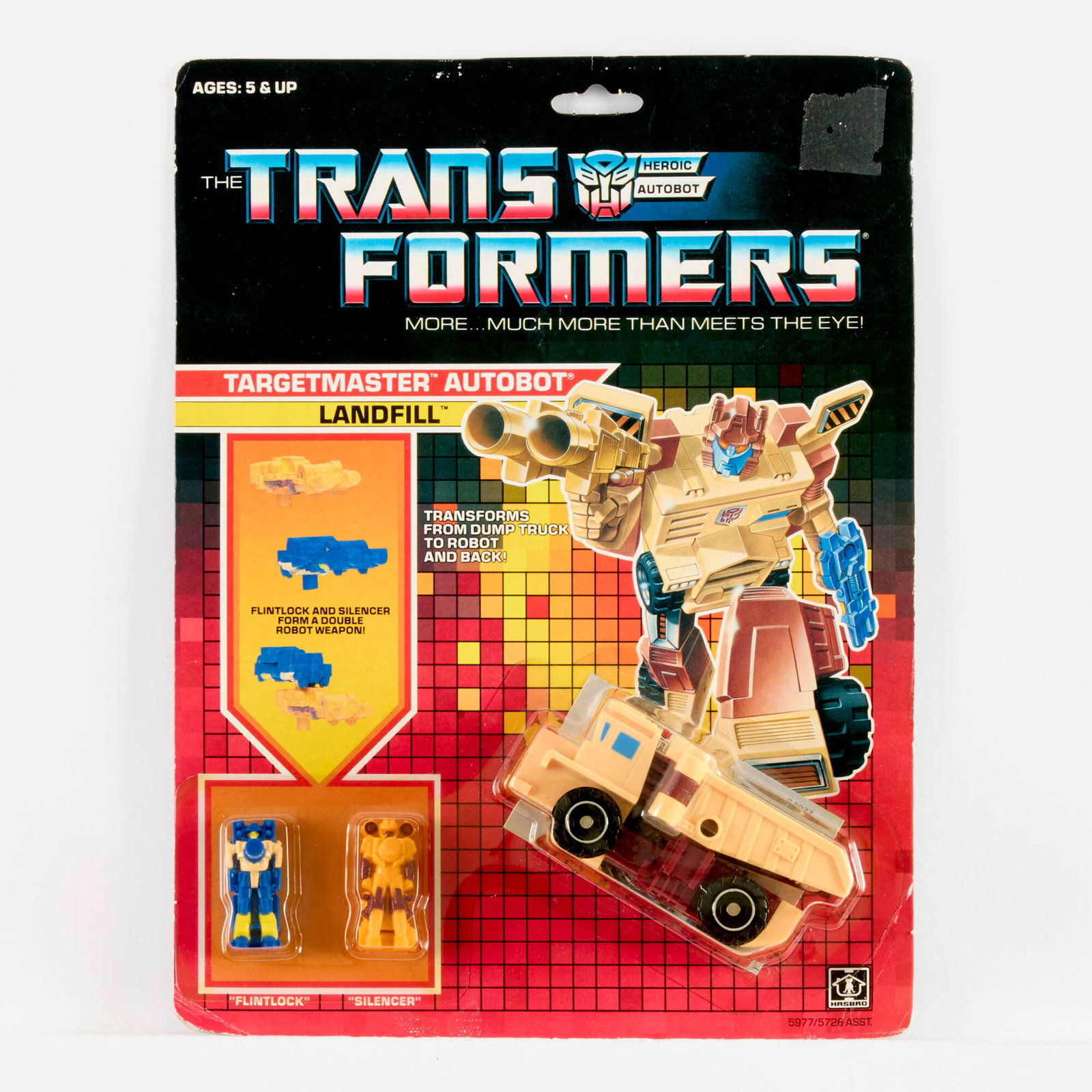 1987 Hasbro Transformers Generation 1 G1 Targetmaster Landfill Factory Sealed: 1987 Hasbro Transformers Generation 1 G1 Targetmaster Landfill Factory Sealed USA, 1987 11 h x 8.25 w x 2 d in (28 x 21 x 5 cm) Factory Sealed. 5977/5728. Comes with Flintlock and Silencer.Condition N