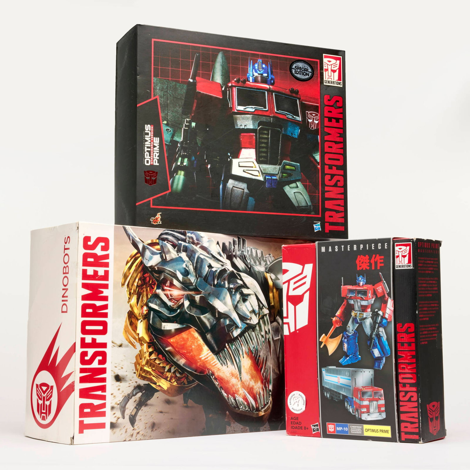 3PC 2013-2016 Hasbro and Hot Toys Transformers Optimus Prime and Dinobots Group: 3PC 2013-2016 Hasbro and Hot Toys Transformers Optimus Prime and Dinobots Group USA, 2013-2016 14 h x 21.25 w x 7 d in (36 x 54 x 18 cm) 14.25 h x 16.5 w x 5 d in (36 x 42 x 13 cm) 13 h x 10 w x 4 d i