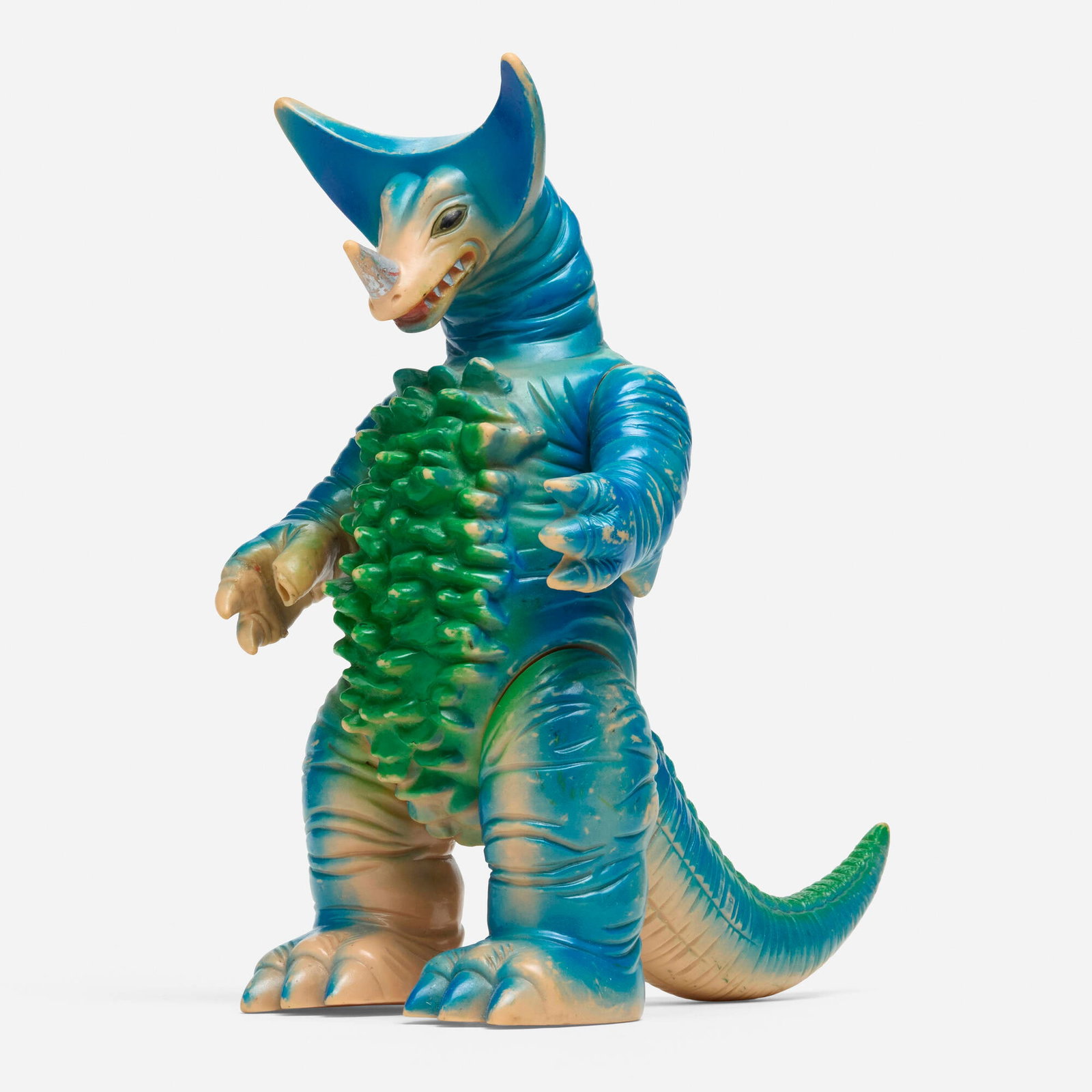 Bullmark Ultraman Gomora Giant Vinyl: Bullmark Ultraman Gomora Giant Vinyl Bullmark Japan, c. 1970 12.25 h x 7 w x 12 d in (31 x 18 x 30 cm) Condition notes: Overall fair condition with minimal scattered paint rubs and broken thumb. This